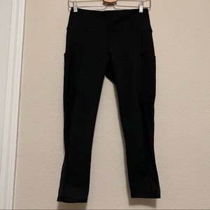 Fabletics Black On-the-Go High-Waisted Capri Legging with Phone Pocket Size M